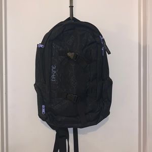 black and purple dakine backpack. great condition!